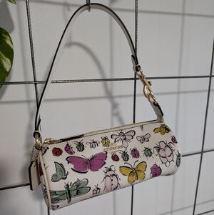 Coach Nolita Barrel Bag Purse With Insect Creature Print.